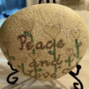 Beautiful hand painted rock named “Peace and Love” one of a kind original